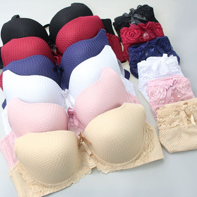 Conjunto de bragas y sujetador sexy sin costuras para mujer, lencería de entrenamiento de color sólido con realce